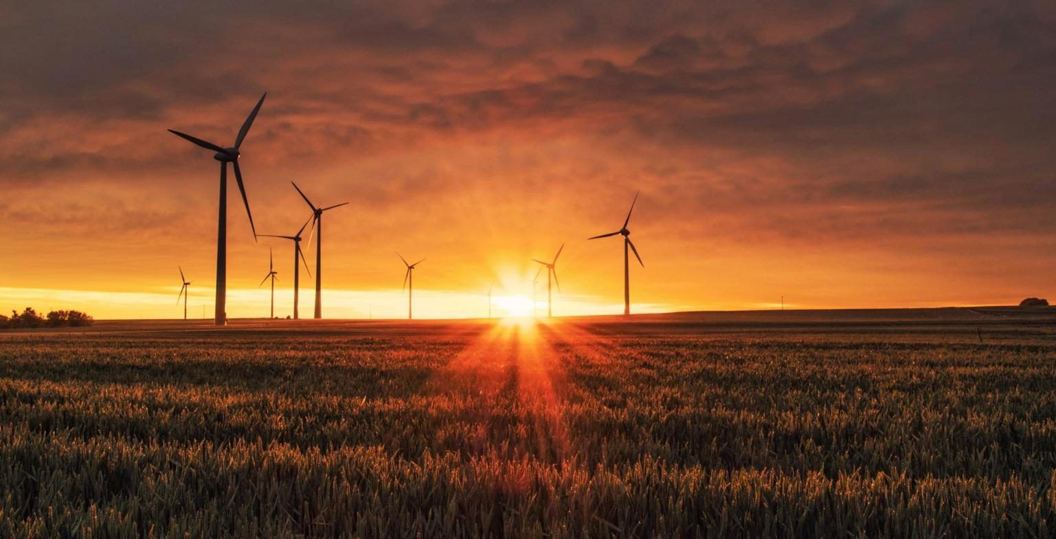 Wind turbines at sunset